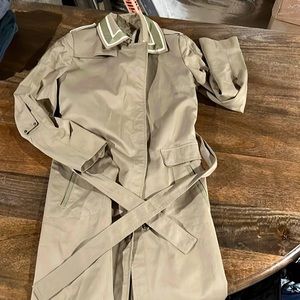 Belted trench coat.